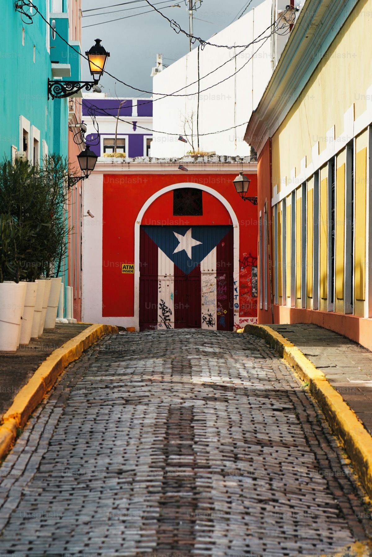 Cobblestone street with Puerto Rico flags